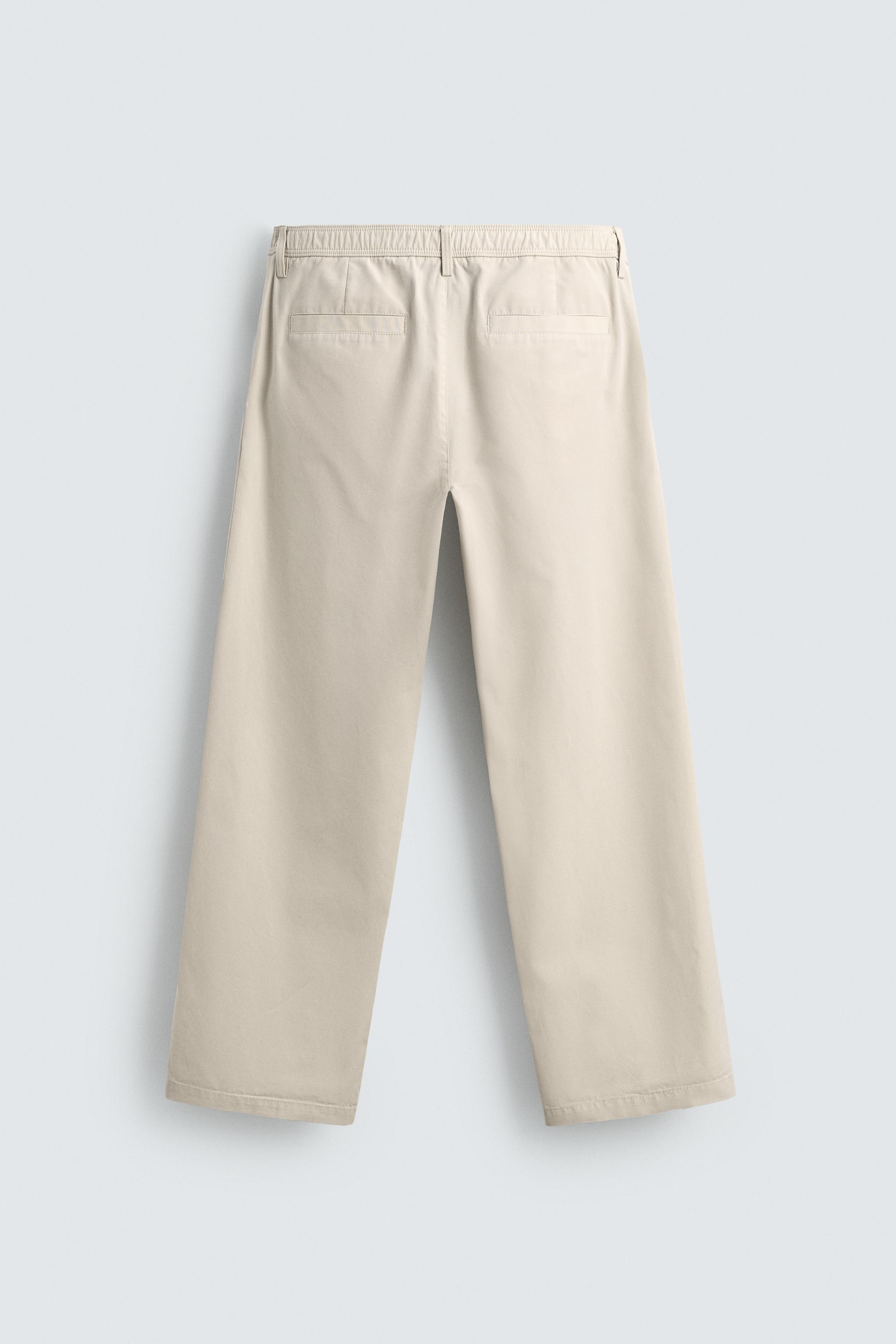 PLEATED STRAIGHT FIT PANTS